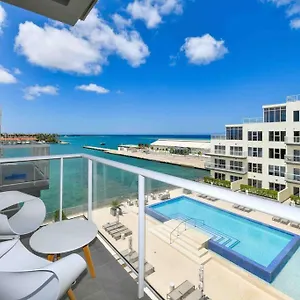https://new-2bd-2bath-apt-with-ocean-view-pool-gym.comcaribbean.com